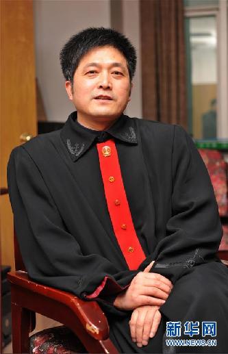 （圖文互動(dòng)）其人如蘭，既潔且馨——追記“全國模范法官”胡國運(yùn)